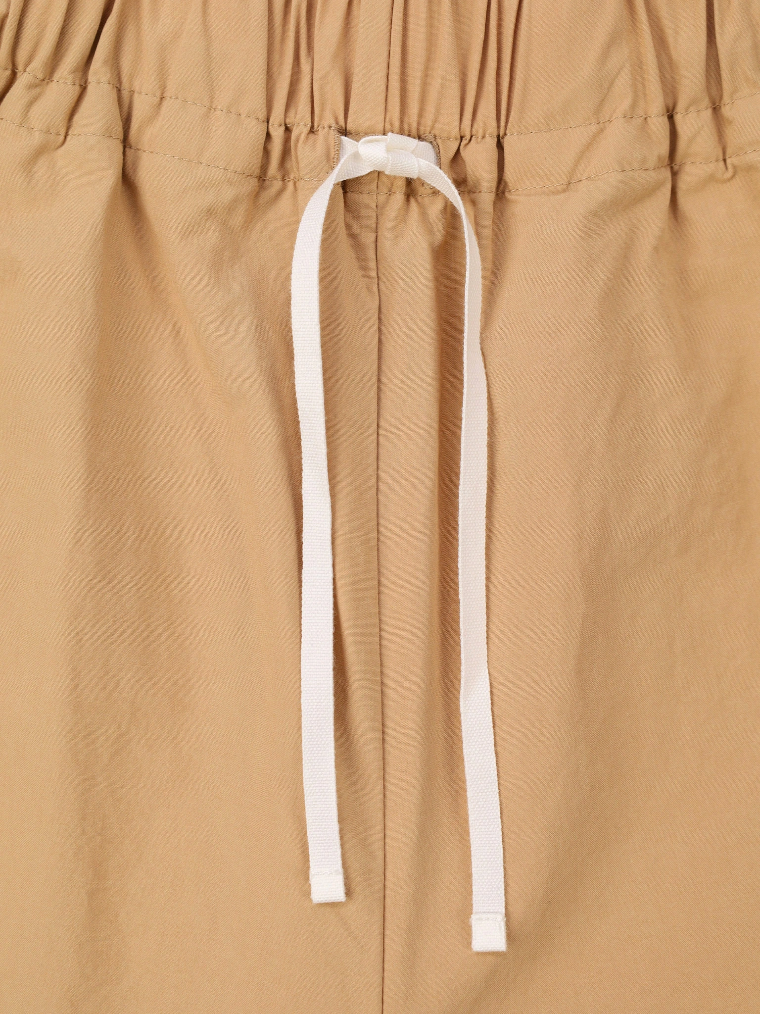 Брюки бежевого цвета из хлопка прямого кроя